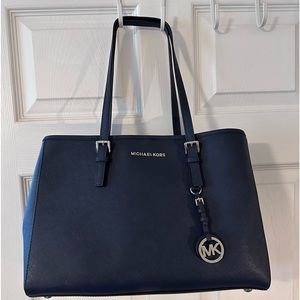 MK purse in almost new condition. Worn twice. Navy blue. Clean inside and out.